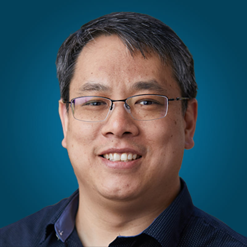 Portrait of Alex Au Yeung, Trellix Chief Product Officer