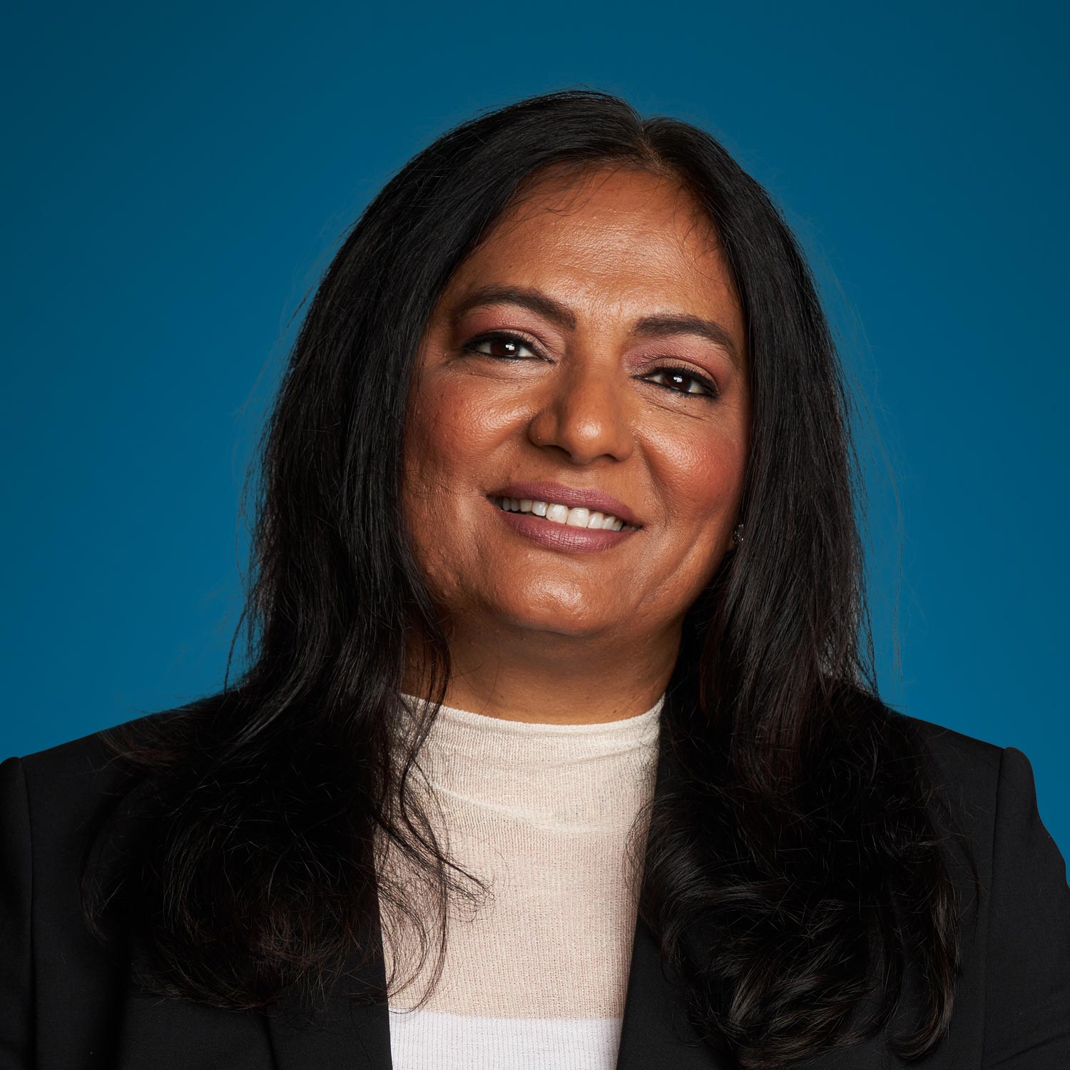 Portrait of Aparna Rayasam, Trellix Chief Product Officer