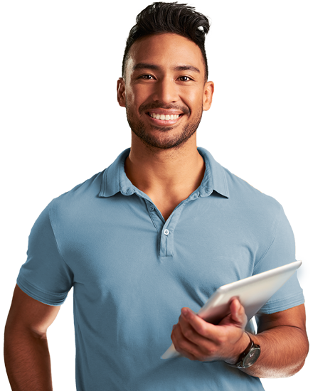 Man smiling and holding tablet
