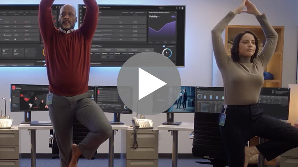 Video thumbnail of people doing yoga in an office environment